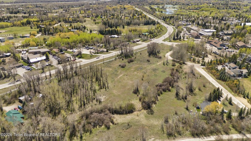 Set on 5 pristine acres in Jackson Hole, WY 83001 this - photo 15