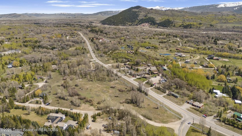 Set on 5 pristine acres in Jackson Hole, WY 83001 this - photo 16
