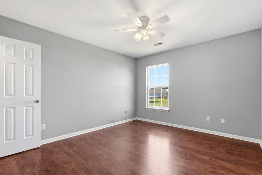 Stunning, move-in ready home nestled within The Farm at Carolina - photo 31