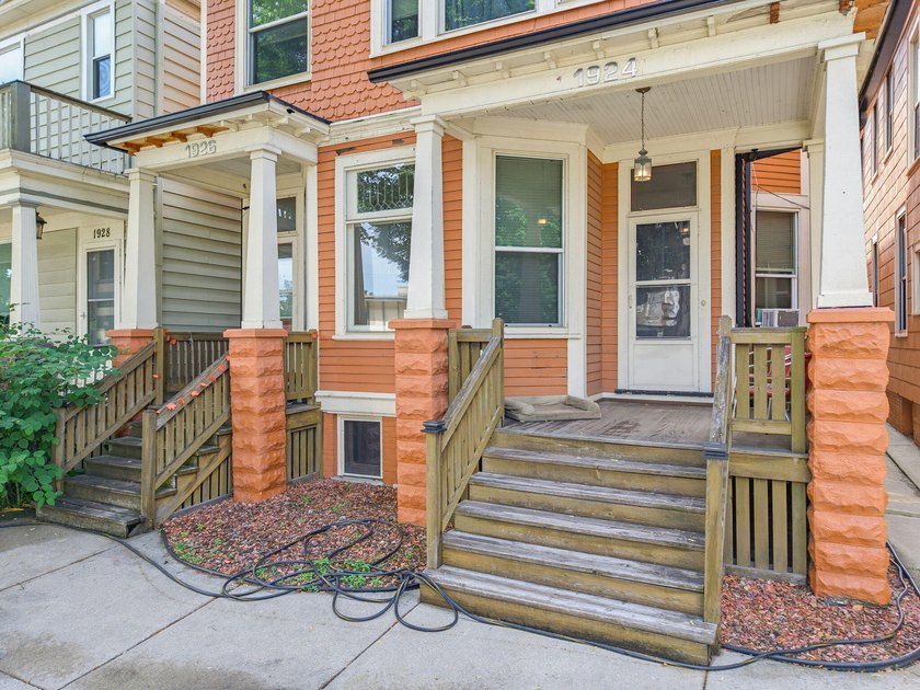 This historic duplex was designed and built in 1893 by the - photo 3