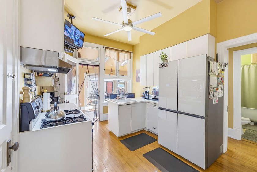 This historic duplex was designed and built in 1893 by the - photo 8