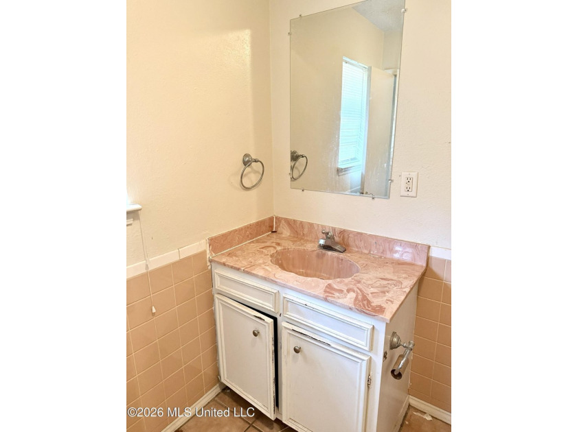 AS-IS Investment Opportunity in Ocean Springs! Unlock the - photo 12