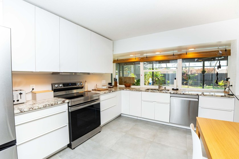 Welcome to this 4 bedroom, 2 bathroom pool home featuring a - photo 14