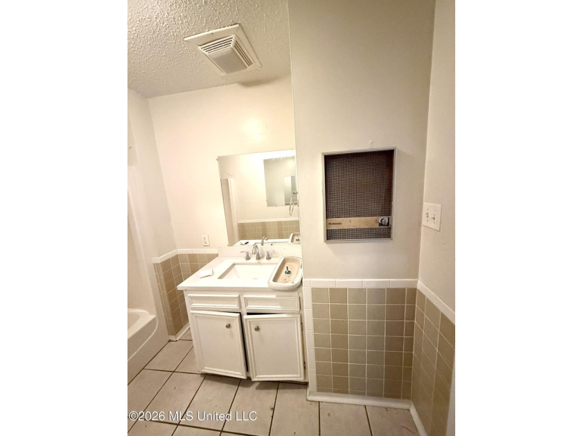 AS-IS Investment Opportunity in Ocean Springs! Unlock the - photo 17