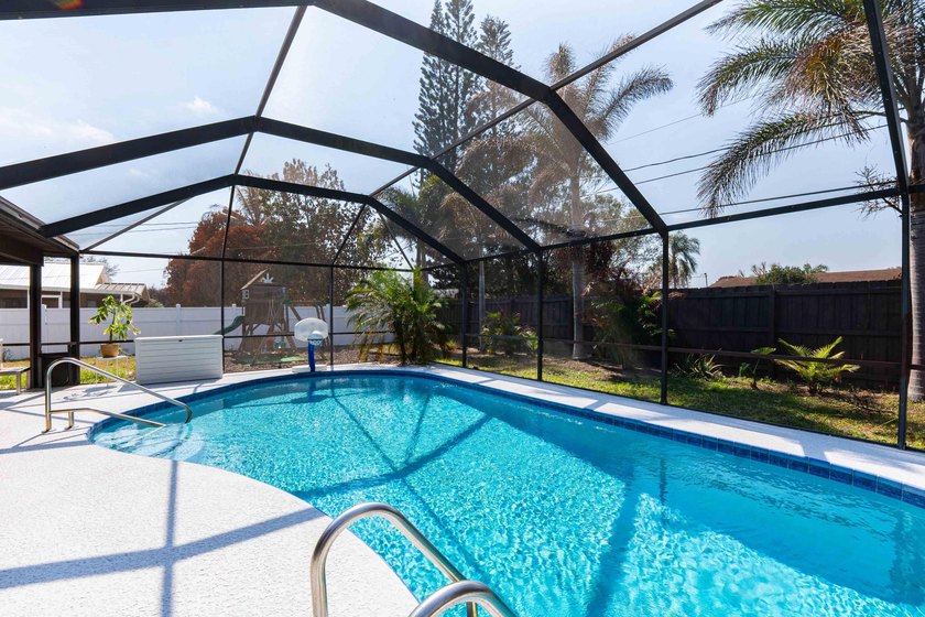 Welcome to this 4 bedroom, 2 bathroom pool home featuring a - photo 31