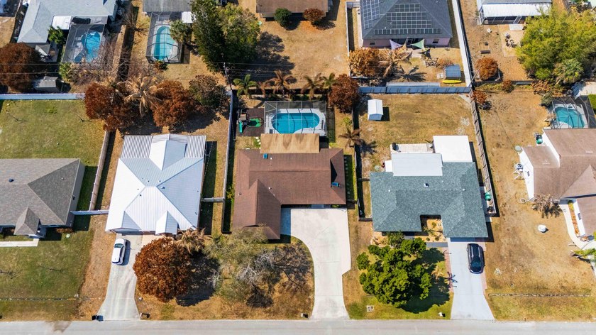 Welcome to this 4 bedroom, 2 bathroom pool home featuring a - photo 38