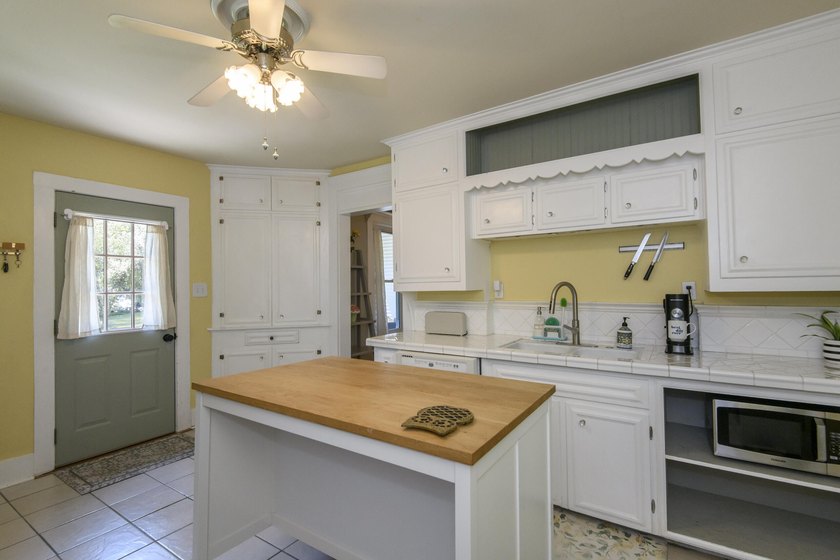 This stunning home is located on a hill overlooking Pewaukee - photo 6