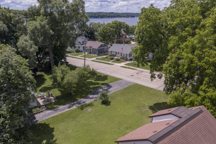 This stunning home is located on a hill overlooking Pewaukee - photo 8