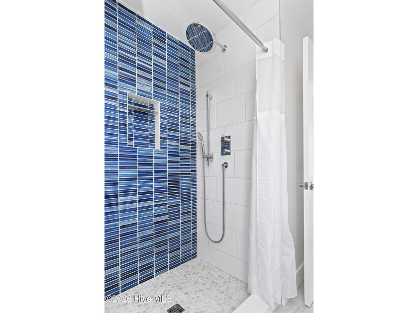 Welcome to 7321 Ocean Drive, a beautifully appointed 4-bedroom - photo 28