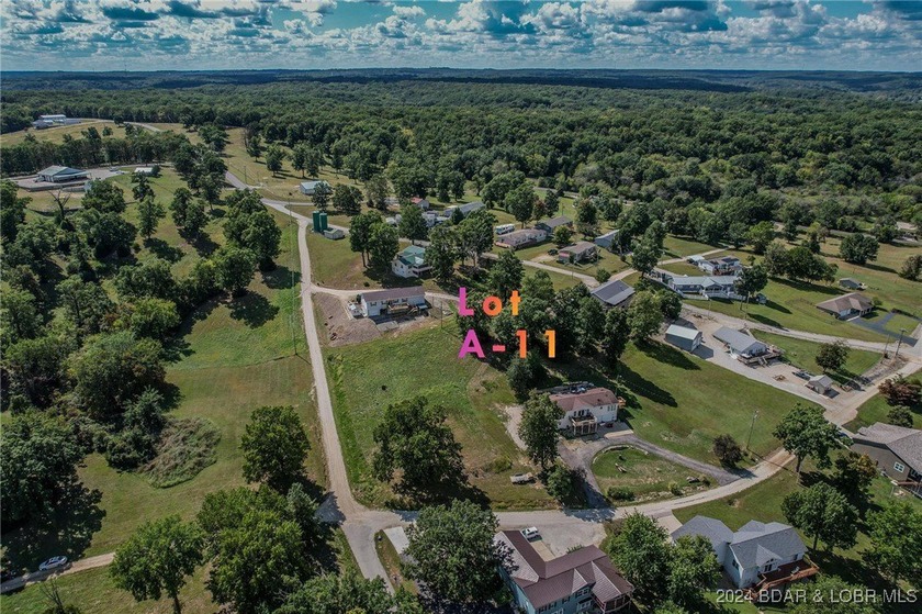 Lot A-11 in Johnsons Bay subdivision is a .41acre lot with a - photo 5