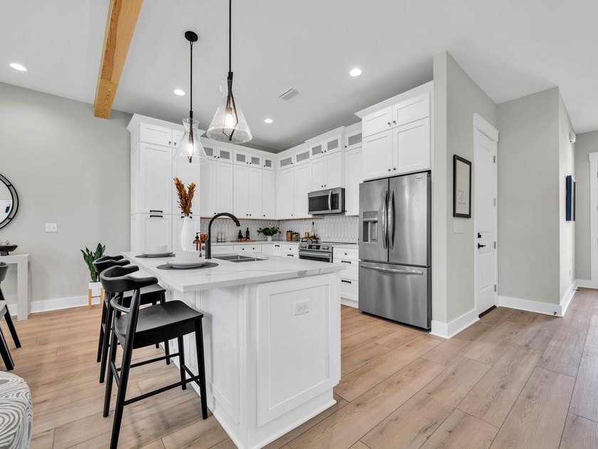 End Unit! Welcome to The Oaks, a charming neighborhood nestled - photo 4