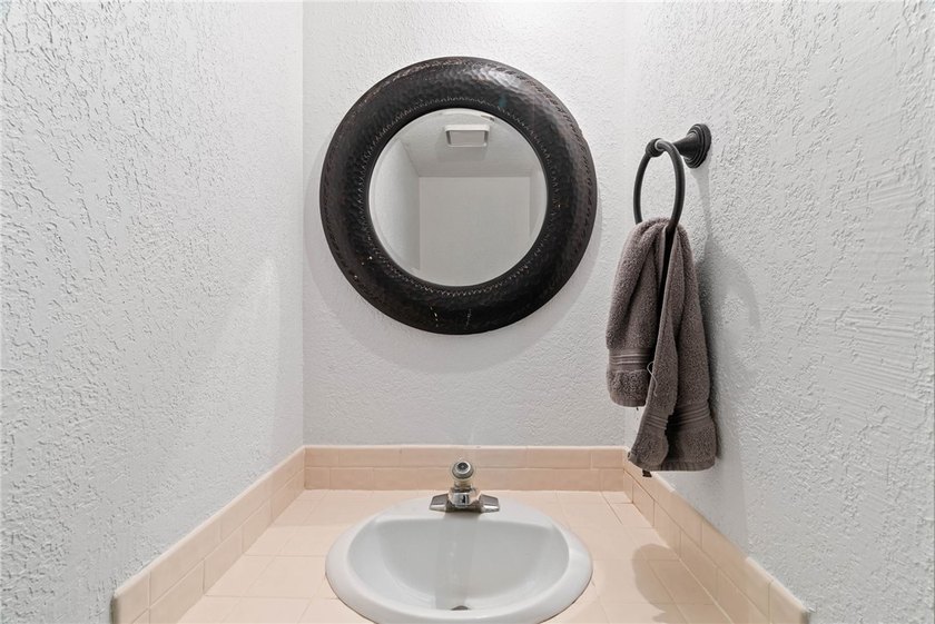 Welcome home to this beautifully updated end-unit townhome - photo 13