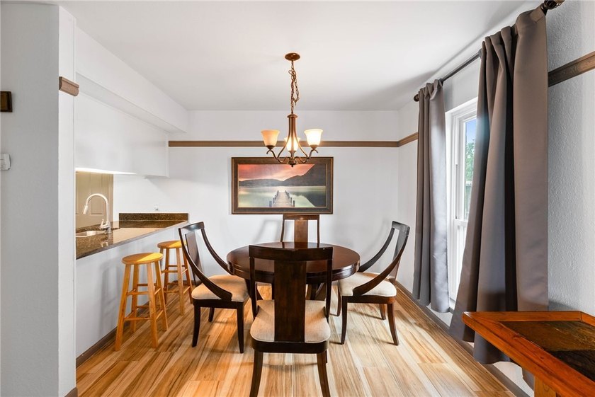 Welcome home to this beautifully updated end-unit townhome - photo 15