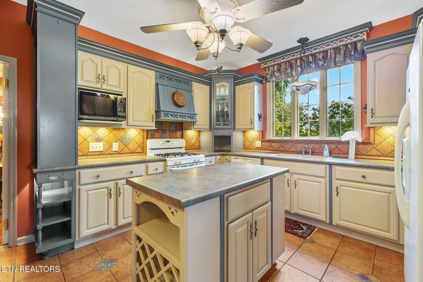 This custom built house is a combination of Greek Revival and - photo 22