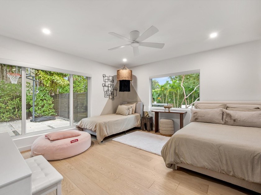 LUXURY updated 4 bedroom/3 bathroom SMART home in Coral Ridge - photo 20