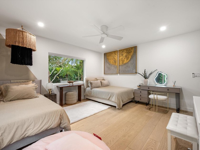 LUXURY updated 4 bedroom/3 bathroom SMART home in Coral Ridge - photo 21