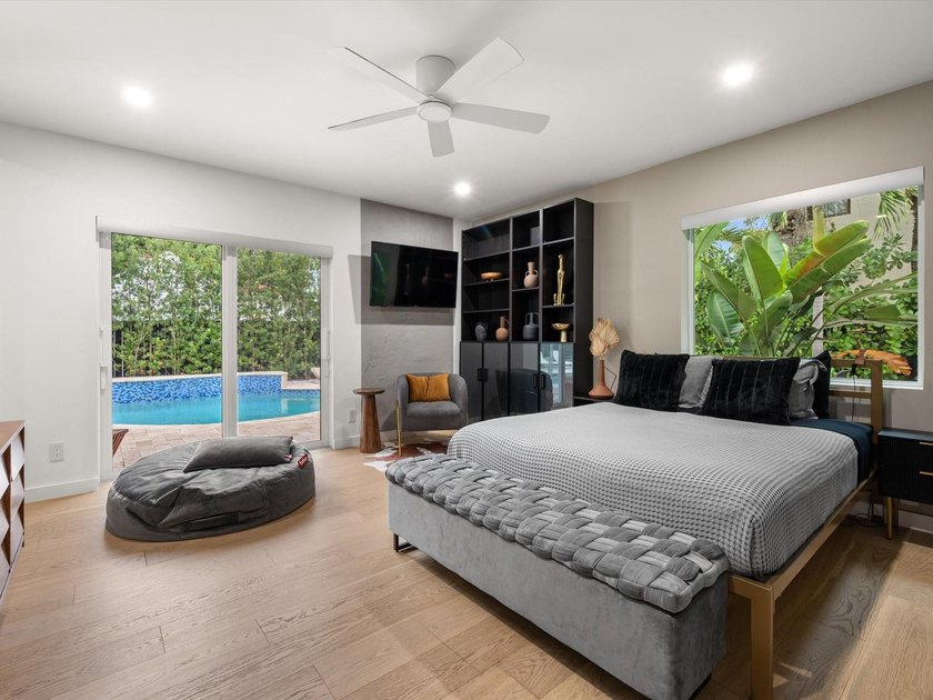 LUXURY updated 4 bedroom/3 bathroom SMART home in Coral Ridge - photo 23