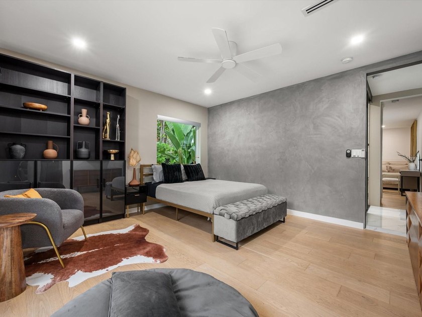 LUXURY updated 4 bedroom/3 bathroom SMART home in Coral Ridge - photo 24
