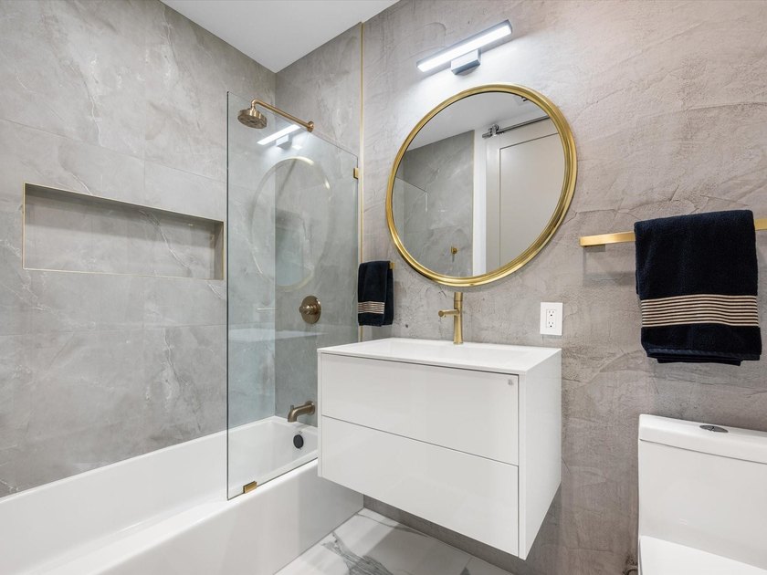 LUXURY updated 4 bedroom/3 bathroom SMART home in Coral Ridge - photo 25