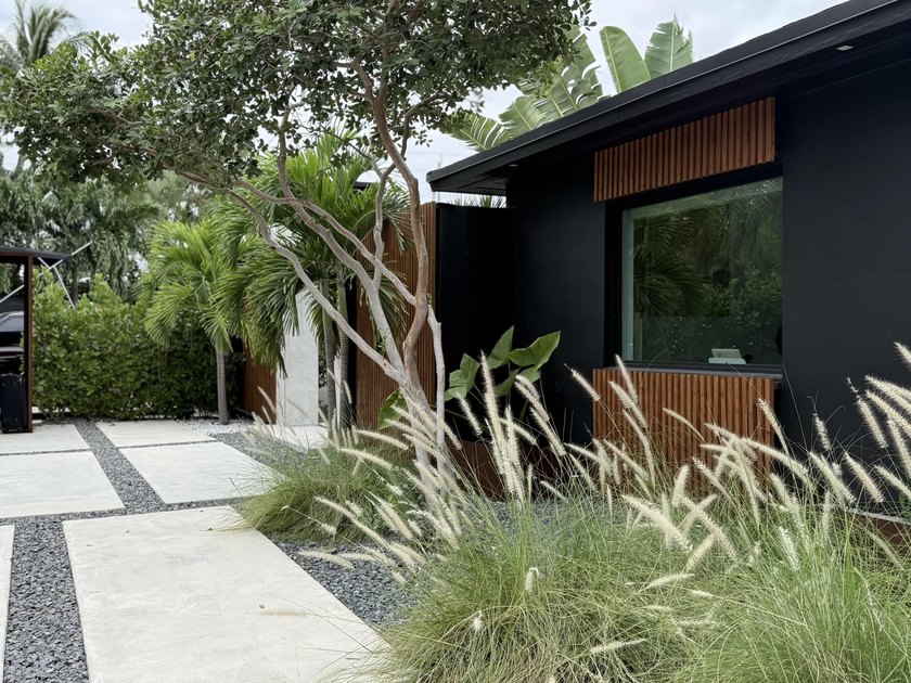 LUXURY updated 4 bedroom/3 bathroom SMART home in Coral Ridge - photo 28