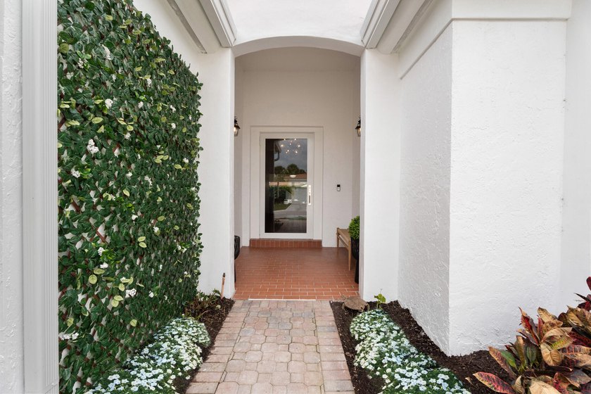 Tastefully updated 3-bedroom, 3.5-bath residence in the highly - photo 4