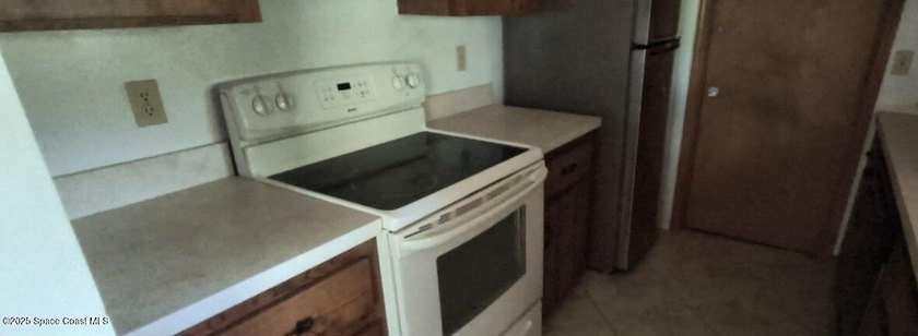 Welcome home to this charming 3-bedroom, 2-bathroom brick - photo 6