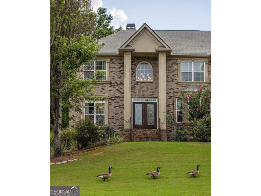 Set on two expansive lots within a private community, this - photo 12