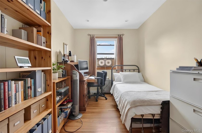 South Facing solid 20-foot wide attached brick townhouse in the - photo 12