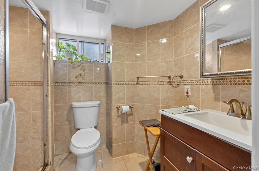 South Facing solid 20-foot wide attached brick townhouse in the - photo 14