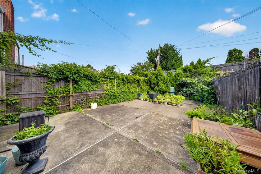 South Facing solid 20-foot wide attached brick townhouse in the - photo 15