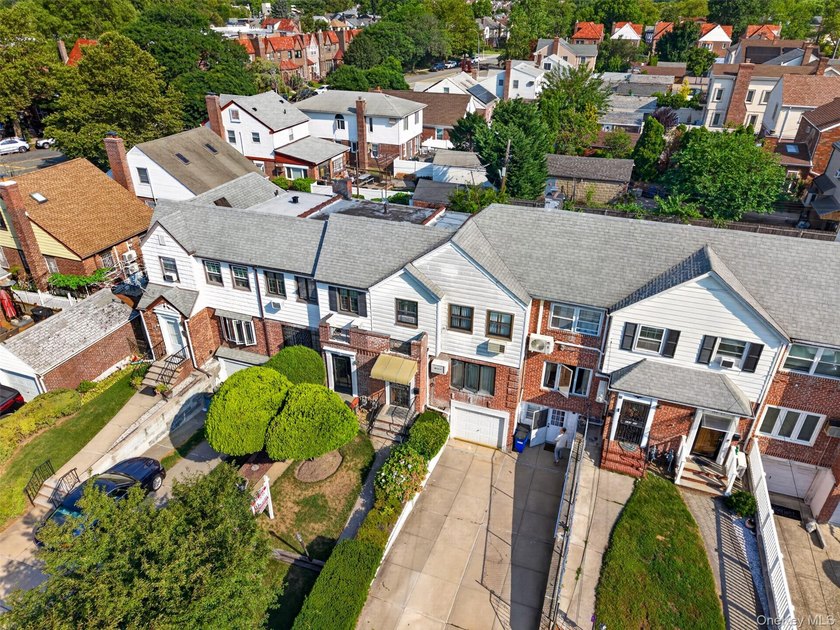 South Facing solid 20-foot wide attached brick townhouse in the - photo 17