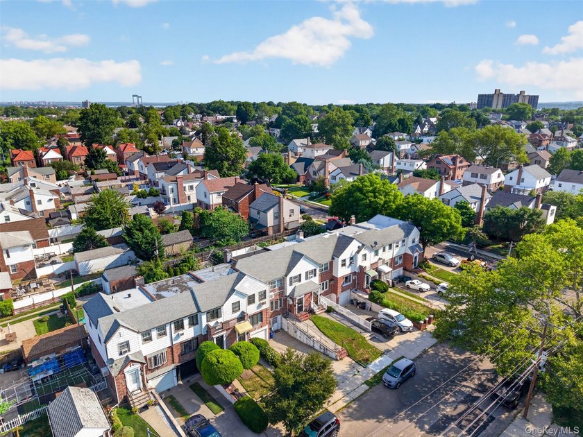 South Facing solid 20-foot wide attached brick townhouse in the - photo 18
