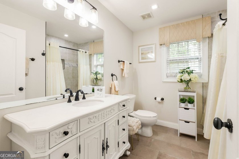 Set on two expansive lots within a private community, this - photo 36
