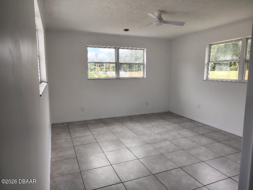 Large Garage or Workshop. Well maintained BLOCK home on a quiet - photo 11