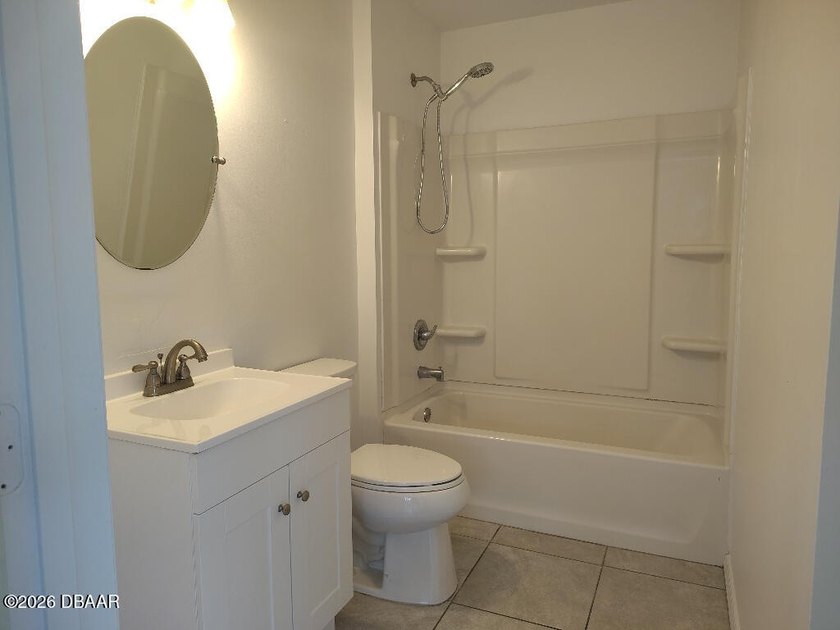 Large Garage or Workshop. Well maintained BLOCK home on a quiet - photo 12