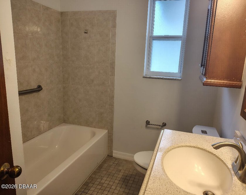 Large Garage or Workshop. Well maintained BLOCK home on a quiet - photo 14