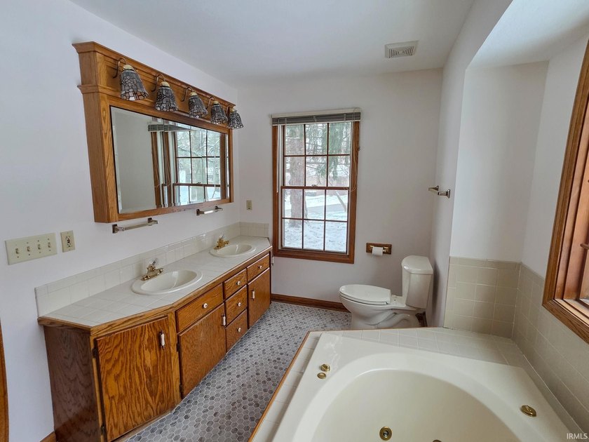 Situated on a picturesque 1.59-acre mostly level lot with a - photo 21