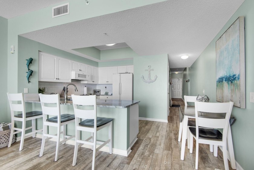 This turnkey, fully furnished 1-bedroom condo at Majestic Sun - photo 17