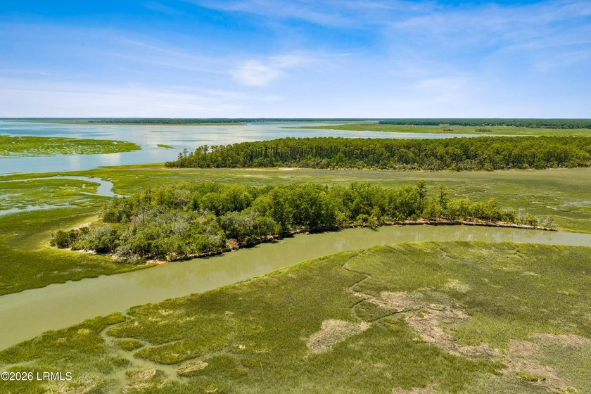 Discover an extraordinary 8-acre private island paradise, where - photo 23