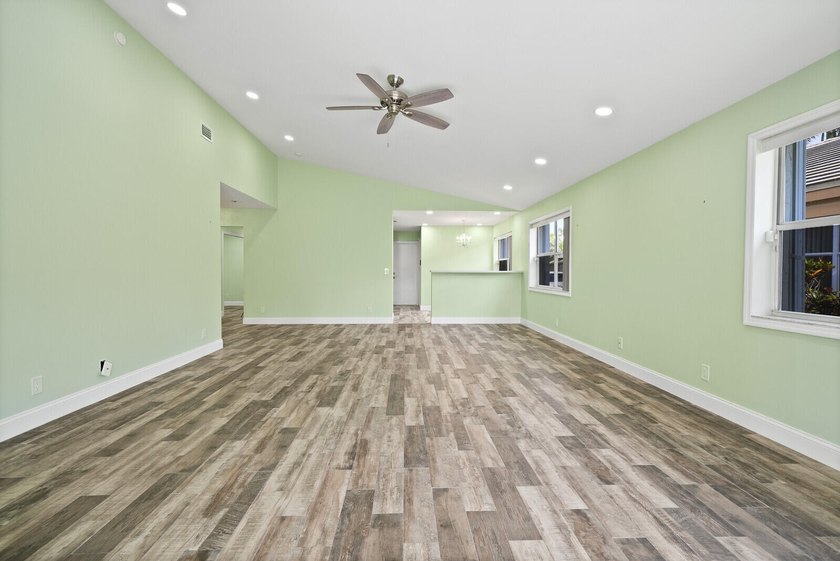 Discover this beautifully renovated 3-bedroom, 2-bath residence - photo 32