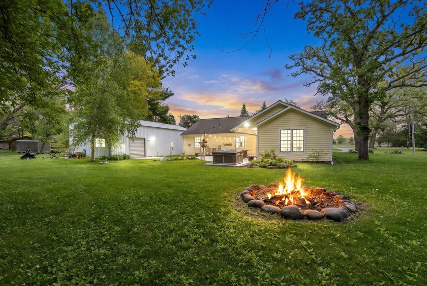 Set on nearly an acre in a close-knit lake community, this - photo 3