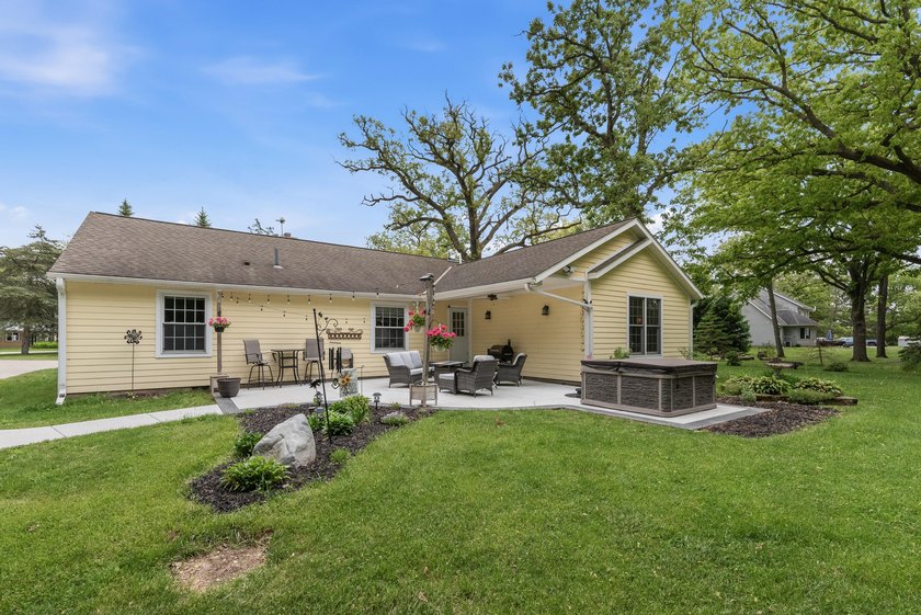Set on nearly an acre in a close-knit lake community, this - photo 8