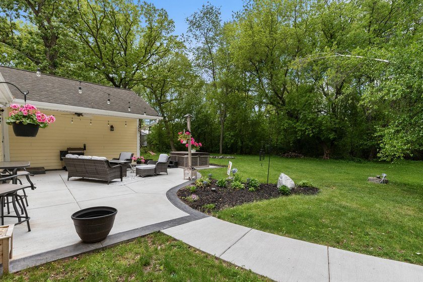 Set on nearly an acre in a close-knit lake community, this - photo 9