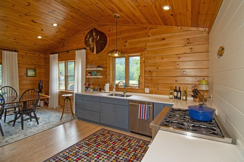 Welcome to this beautifully renovated log home tucked away in a - photo 21