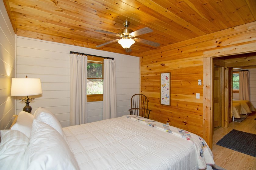Welcome to this beautifully renovated log home tucked away in a - photo 39