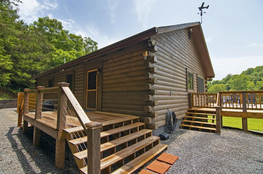 Welcome to this beautifully renovated log home tucked away in a - photo 45