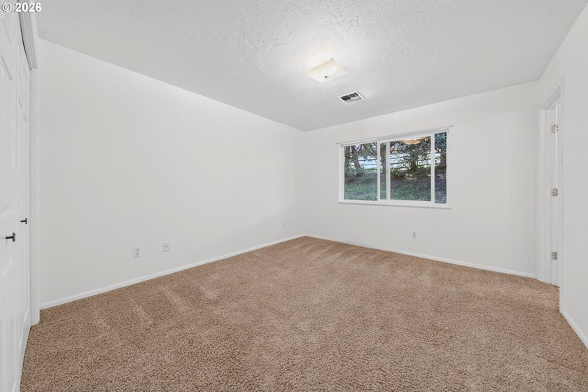 Nestled on over half an acre, this versatile 2-story home offers - photo 14