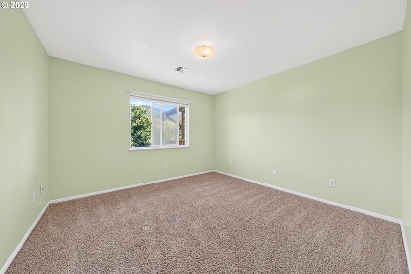 Nestled on over half an acre, this versatile 2-story home offers - photo 19