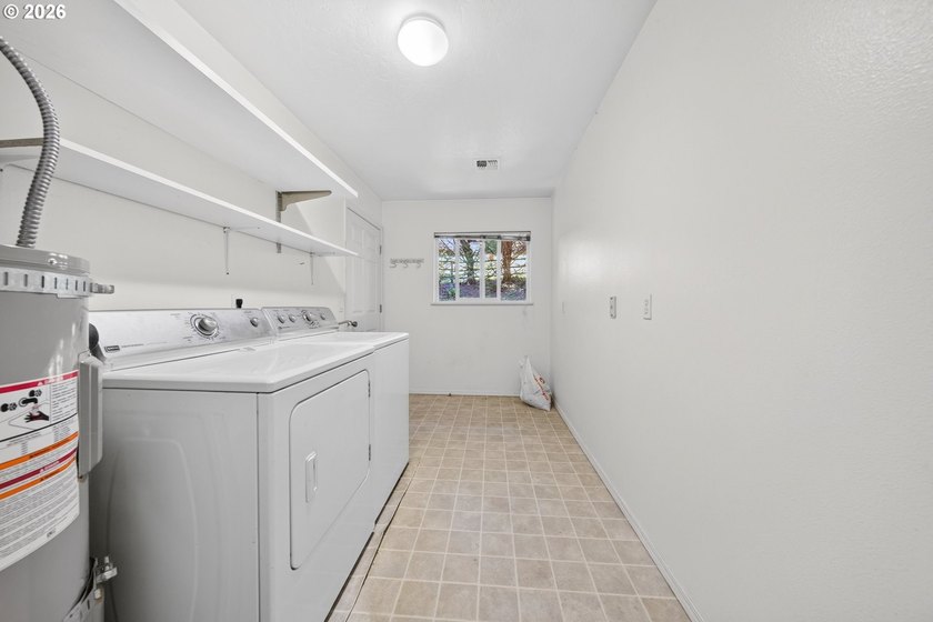 Nestled on over half an acre, this versatile 2-story home offers - photo 27