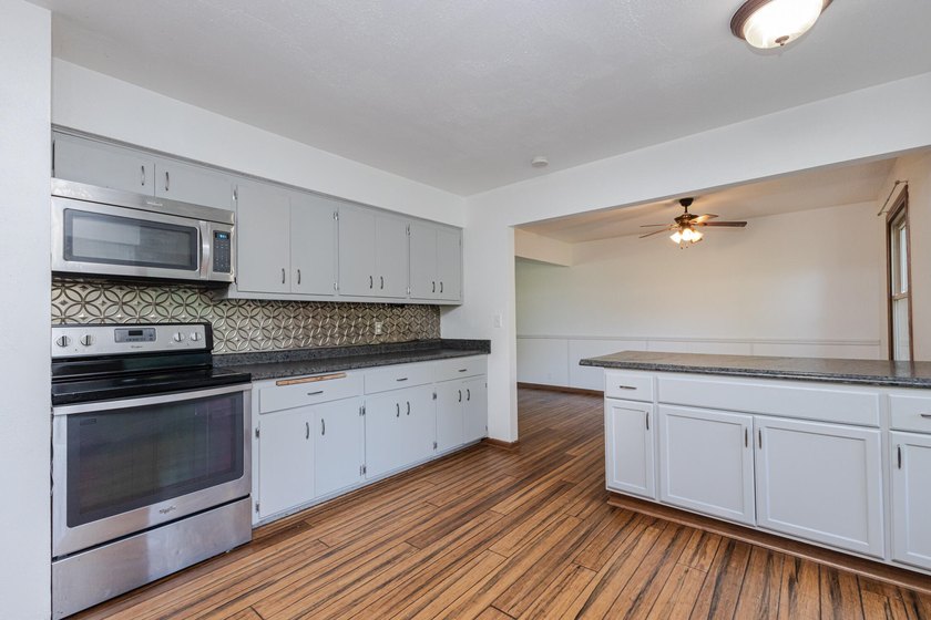 Enjoy the perfect blend of space, updates, and location on this - photo 4